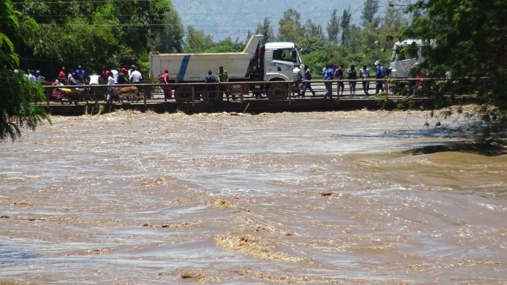 Flood Alert: River Nyando Overflows at Ahero Bridge, Disrupting Transport