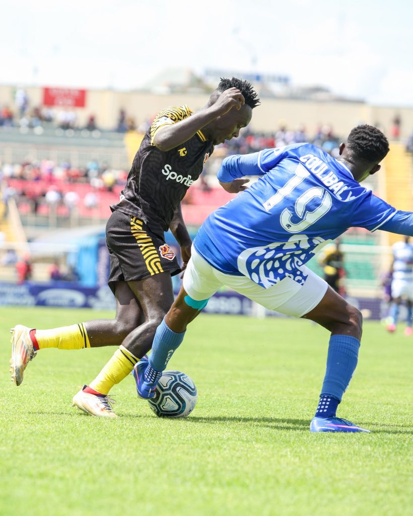 Joe Waithera Battle Ball With Lasso Coullibally at Nyayo Stadium